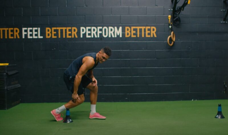 Guy practicing agility drills indoor